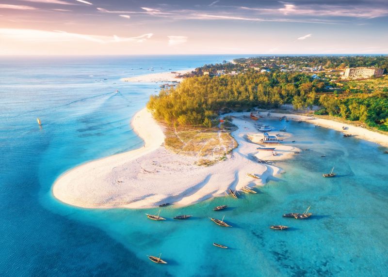 Pristine white sand beach with turquoise waters in Zanzibar